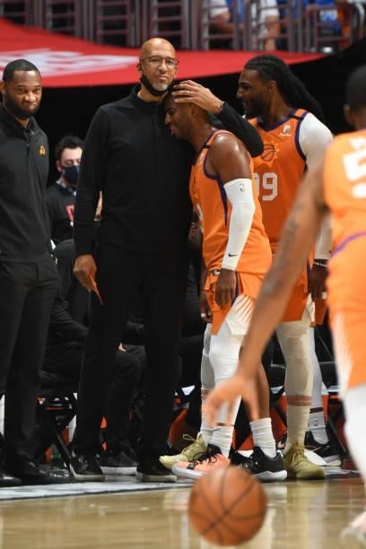 Chris Paul of the Phoenix Suns hugs Head Coach Monty Williams of the Phoenix Suns during Game 6 of the Western Conference Finals of the 2021 NBA...