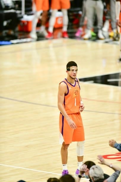 Devin Booker of the Phoenix Suns looks on during the game against the LA Clippers during Game 6 of the Western Conference Finals of the 2021 NBA...
