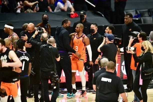 Kawhi Leonard of the LA Clippers talks to Chris Paul of the Phoenix Suns after the game during Game 6 of the Western Conference Finals of the 2021...