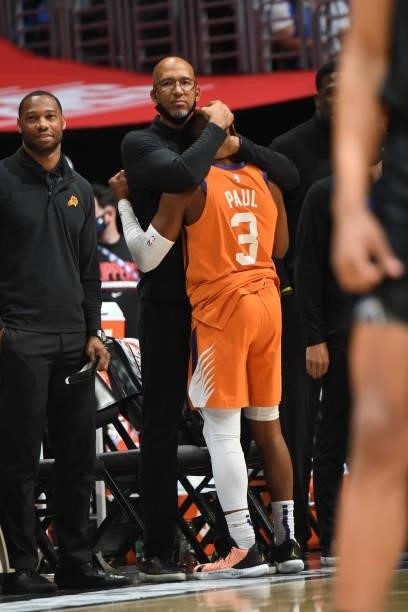 Chris Paul of the Phoenix Suns hugs Head Coach Monty Williams of the Phoenix Suns during Game 6 of the Western Conference Finals of the 2021 NBA...