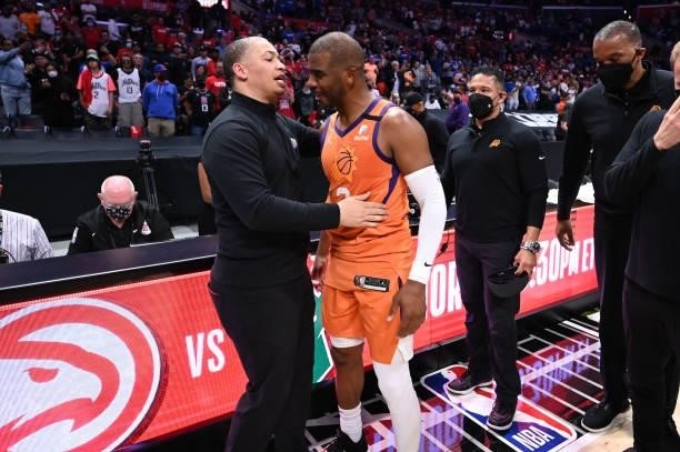 Head Coach Tyronn Lue of the Los Angeles Clippers hugs Chris Paul of the Phoenix Suns during Game 6 of the Western Conference Finals of the 2021 NBA...