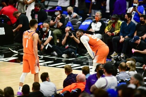 Devin Booker of the Phoenix Suns and Jae Crowder of the Phoenix Suns smile during the game against the LA Clippers during Game 6 of the Western...