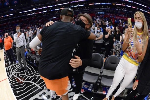 Chris Paul of the Phoenix Suns hugs actor, Billy Crystal after Game 6 of the Western Conference Finals of the 2021 NBA Playoffs on June 30, 2021 at...