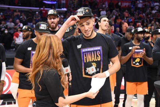 Devin Booker of the Phoenix Suns is interviewed with ESPN sideline reporter, Rachel Nichols during Game 6 of the Western Conference Finals of the...