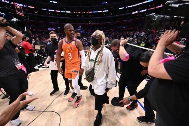 Chris Paul of the Phoenix Suns celebrates with rapper, Lil Wayne after the game during Game 6 of the Western Conference Finals of the 2021 NBA...