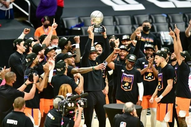 Head Coach Monty Williams of the Phoenix Suns holds the Western Conference Finals Trophy after the game against the LA Clippers during Game 6 of the...