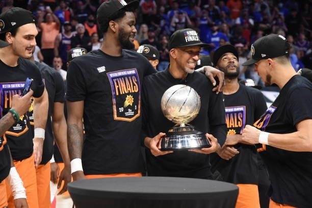 Head Coach Monty Williams of the Phoenix Suns holds up the Western Conference Finals trophy after Game 6 of the Western Conference Finals of the 2021...