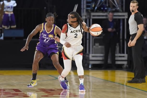 Erica Wheeler of the Los Angeles Sparks plays defense on Riquna Williams of the Las Vegas Aces on June 30, 2021 at the Los Angeles Convention Center...