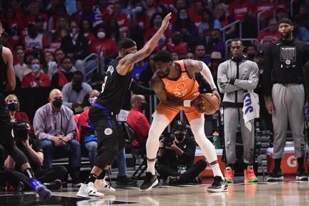 Marcus Morris Sr. #8 of the LA Clippers plays defense on Deandre Ayton of the Phoenix Suns during Game 6 of the Western Conference Finals of the 2021...