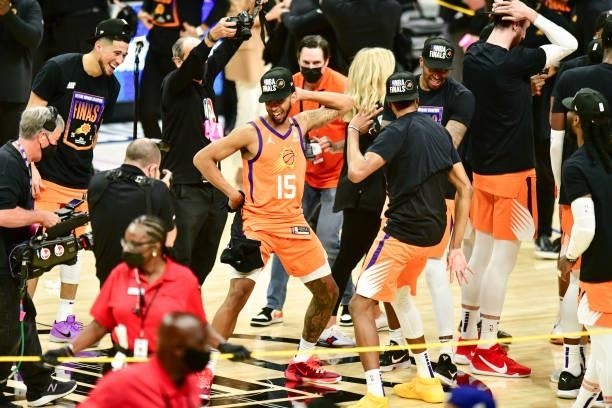Cameron Payne of the Phoenix Suns and Mikal Bridges of the Phoenix Suns celebrate after the game against the LA Clippers during Game 6 of the Western...