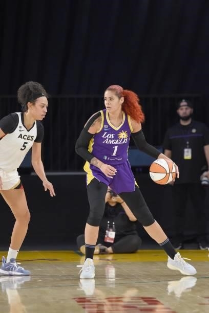 Amanda Zahui B of the Los Angeles Sparks handles the ball against Dearica Hamby of the Las Vegas Aces on June 30, 2021 at the Los Angeles Convention...