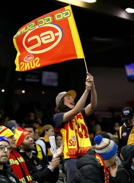 Suns fan cheers during the 2021 AFL Round 16 match between the Gold Coast Suns and the Richmond Tigers at Marvel Stadium on July 01, 2021 in...