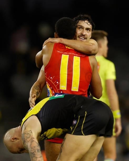 Touk Miller and Izak Rankine of the Suns celebrate during the 2021 AFL Round 16 match between the Gold Coast Suns and the Richmond Tigers at Marvel...