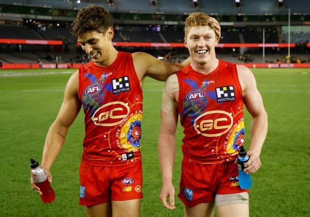 Sean Lemmens and Matt Rowell of the Suns celebrate during the 2021 AFL Round 16 match between the Gold Coast Suns and the Richmond Tigers at Marvel...