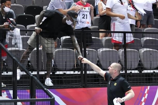 Dennis Schröder congratulates the national coach of Germany Henrik Rodl on the victory during the 2020 FIBA Men's Olympic Qualifying Tournament game...