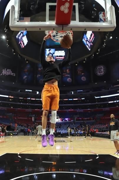 Devin Booker of the Phoenix Suns warms up before the game against the LA Clippers during Game 6 of the Western Conference Finals of the 2021 NBA...
