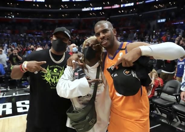 Rapper, Lil Wayne and Chris Paul of the Phoenix Suns pose for a photo during Game 6 of the Western Conference Finals of the 2021 NBA Playoffs on June...