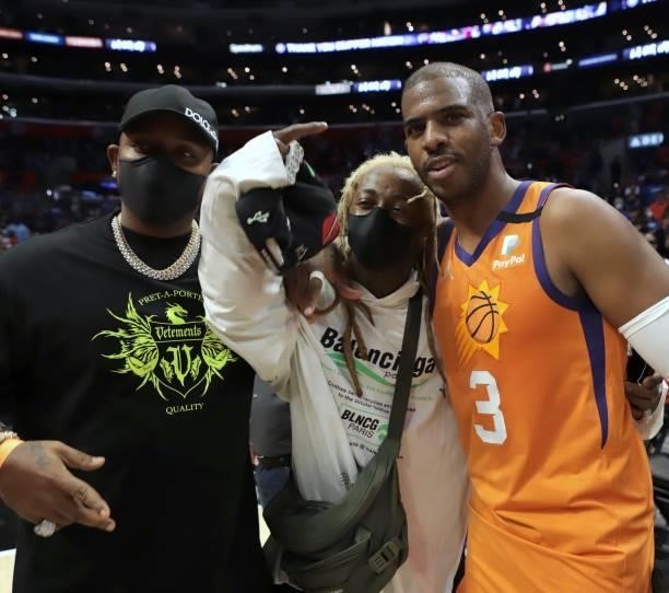 Rapper, Lil Wayne and Chris Paul of the Phoenix Suns pose for a photo during Game 6 of the Western Conference Finals of the 2021 NBA Playoffs on June...