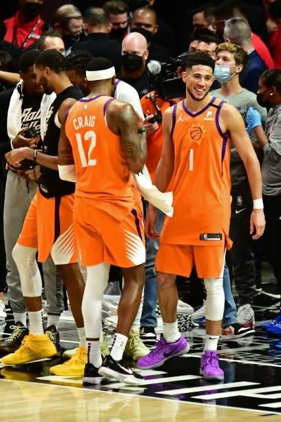 Devin Booker of the Phoenix Suns smiles after the game against the LA Clippers during Game 6 of the Western Conference Finals of the 2021 NBA...