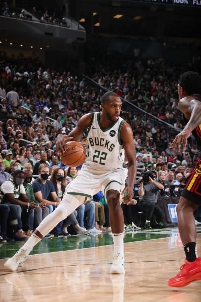 Khris Middleton of the Milwaukee Bucks dribbles the ball against the Atlanta Hawks during Game 5 of the Eastern Conference Finals of the 2021 NBA...