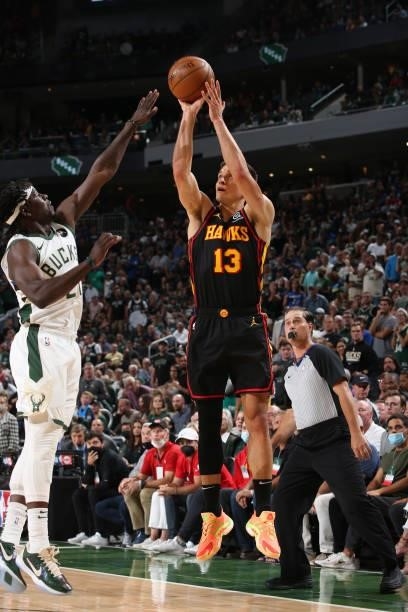 Bogdan Bogdanovic of the Atlanta Hawks shoots a three point basket against the Milwaukee Bucks during Game 5 of the Eastern Conference Finals of the...