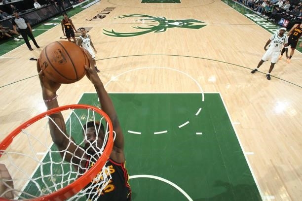 Clint Capela of the Atlanta Hawks dunks the ball against the Milwaukee Bucks during Game 5 of the Eastern Conference Finals of the 2021 NBA Playoffs...