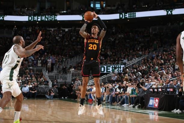 John Collins of the Atlanta Hawks shoots the ball against the Milwaukee Bucks during Game 5 of the Eastern Conference Finals of the 2021 NBA Playoffs...