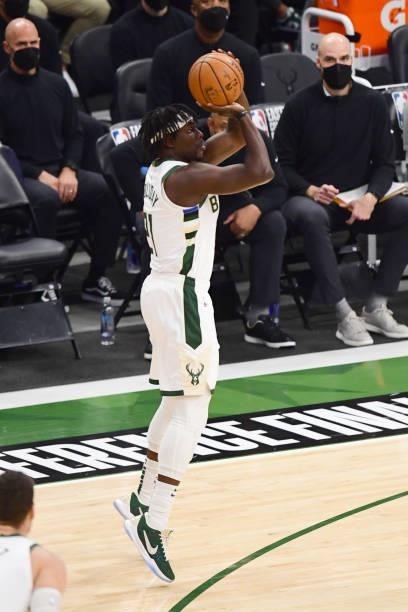 Jrue Holiday of the Milwaukee Bucks shoots a three-pointer during the game against the Atlanta Hawks during Game 5 of the Eastern Conference Finals...