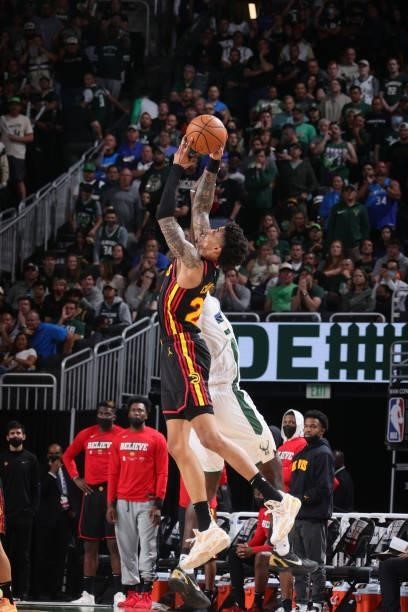 John Collins of the Atlanta Hawks reaches for the ball against the Milwaukee Bucks during Game 5 of the Eastern Conference Finals of the 2021 NBA...