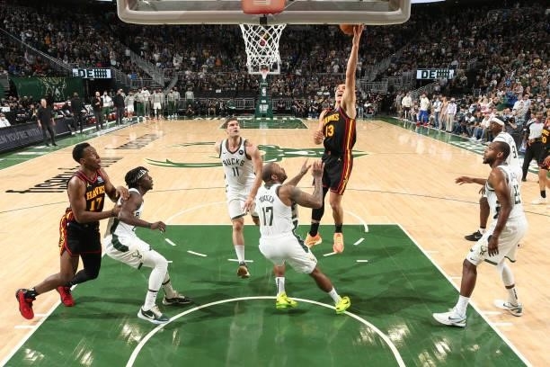 Bogdan Bogdanovic of the Atlanta Hawks drives to the basket against the Milwaukee Bucks during Game 5 of the Eastern Conference Finals of the 2021...