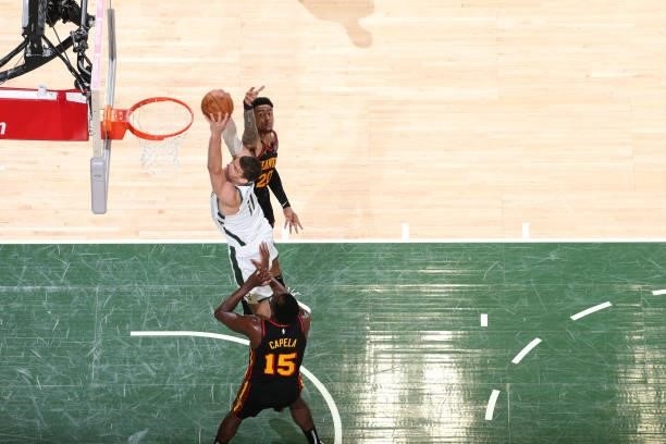Brook Lopez of the Milwaukee Bucks dunks the ball against the Atlanta Hawks during Game 5 of the Eastern Conference Finals of the 2021 NBA Playoffs...
