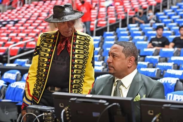 Super Fan, James Goldstein talks to ESPN Announcer, Mark Jackson before the game between the Phoenix Suns and LA Clippers during Game 6 of the...