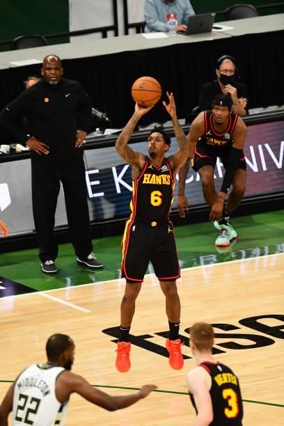 Lou Williams of the Atlanta Hawks shoots a three-pointer during the game against the Milwaukee Bucks during Game 5 of the Eastern Conference Finals...