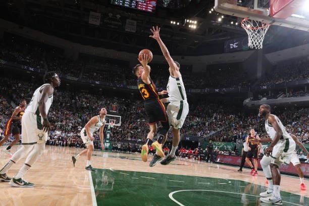 Brook Lopez of the Milwaukee Bucks blocks a shot against the Atlanta Hawks during Game 5 of the Eastern Conference Finals of the 2021 NBA Playoffs on...