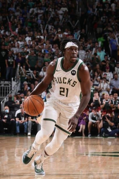 Jrue Holiday of the Milwaukee Bucks dribbles the ball against the Atlanta Hawks during Game 5 of the Eastern Conference Finals of the 2021 NBA...