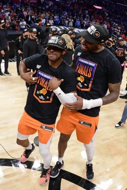 Chris Paul of the Phoenix Suns and Torrey Craig of the Phoenix Suns celebrate after the game against the LA Clippers during Game 6 of the Western...