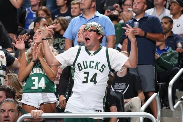 Fans of the Milwaukee Bucks cheer during Game 5 of the Eastern Conference Finals of the 2021 NBA Playoffs on July 1, 2021 at the Fiserv Forum Center...