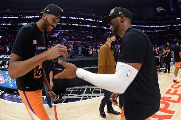 Mikal Bridges of the Phoenix Suns and Chris Paul of the Phoenix Suns celebrate after the game against the LA Clippers during Game 6 of the Western...