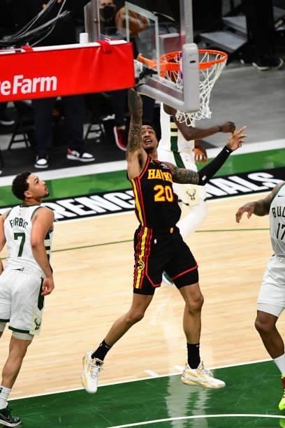 John Collins of the Atlanta Hawks shoots the ball during the game against the Milwaukee Bucks during Game 5 of the Eastern Conference Finals of the...