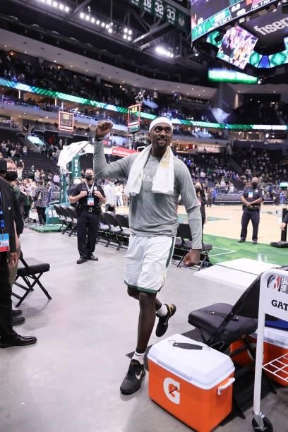 Bobby Portis of the Milwaukee Bucks walks off the court and celebrates after Game 5 of the Eastern Conference Finals of the 2021 NBA Playoffs on July...