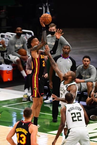 John Collins of the Atlanta Hawks shoots the ball during the game against the Milwaukee Bucks during Game 5 of the Eastern Conference Finals of the...
