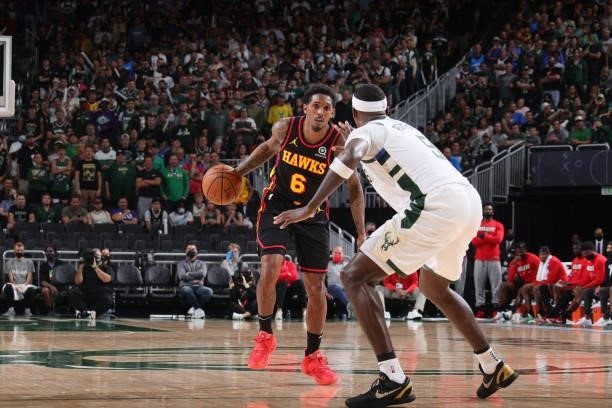 Bobby Portis of the Milwaukee Bucks plays defense on Lou Williams of the Atlanta Hawks during Game 5 of the Eastern Conference Finals of the 2021 NBA...