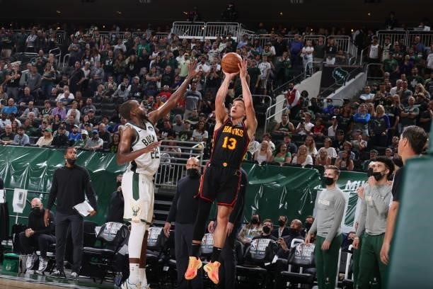 Bogdan Bogdanovic of the Atlanta Hawks shoots a three point basket against the Milwaukee Bucks during Game 5 of the Eastern Conference Finals of the...