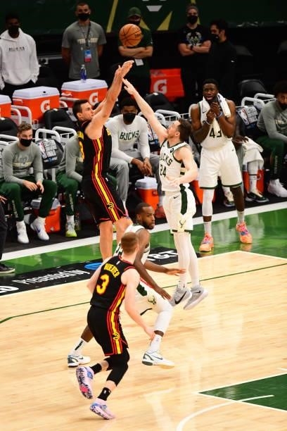 Danilo Gallinari of the Atlanta Hawks shoots a three-pointer during the game against the Milwaukee Bucks during Game 5 of the Eastern Conference...