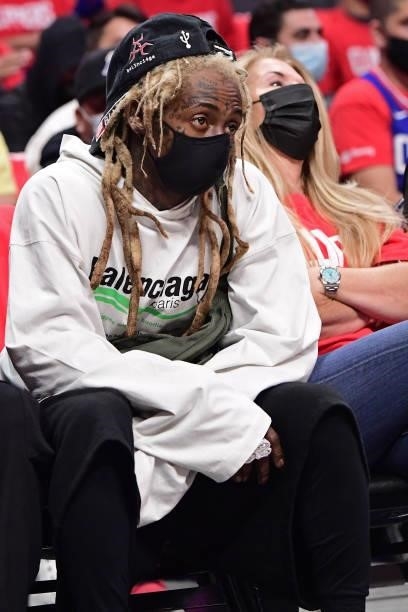 Rapper, Lil Wayne attends a game between the Phoenix Suns and LA Clippers during Game 6 of the Western Conference Finals of the 2021 NBA Playoffs on...