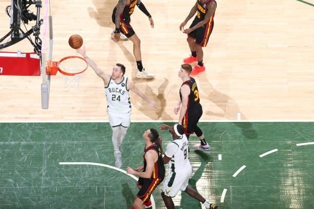 Pat Connaughton of the Milwaukee Bucks drives to the basket against the Atlanta Hawks during Game 5 of the Eastern Conference Finals of the 2021 NBA...