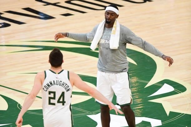Bobby Portis of the Milwaukee Bucks celebrates with teammate Pat Connaughton during the game against the Atlanta Hawks during Game 5 of the Eastern...