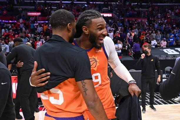 Twaun Moore of the Phoenix Suns hugs Jae Crowder of the Phoenix Suns after the game against the LA Clippers during Game 6 of the Western Conference...