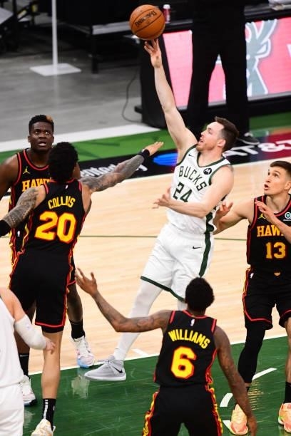 Pat Connaughton of the Milwaukee Bucks shoots the ball during the game against the Atlanta Hawks during Game 5 of the Eastern Conference Finals of...