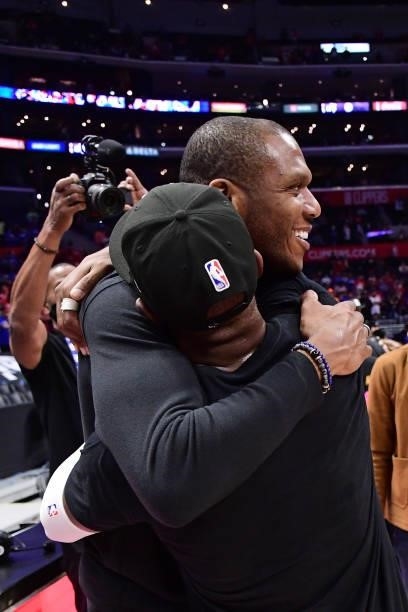 General Manager, James Jones hugs Chris Paul of the Phoenix Suns after the game against the LA Clippers during Game 6 of the Western Conference...